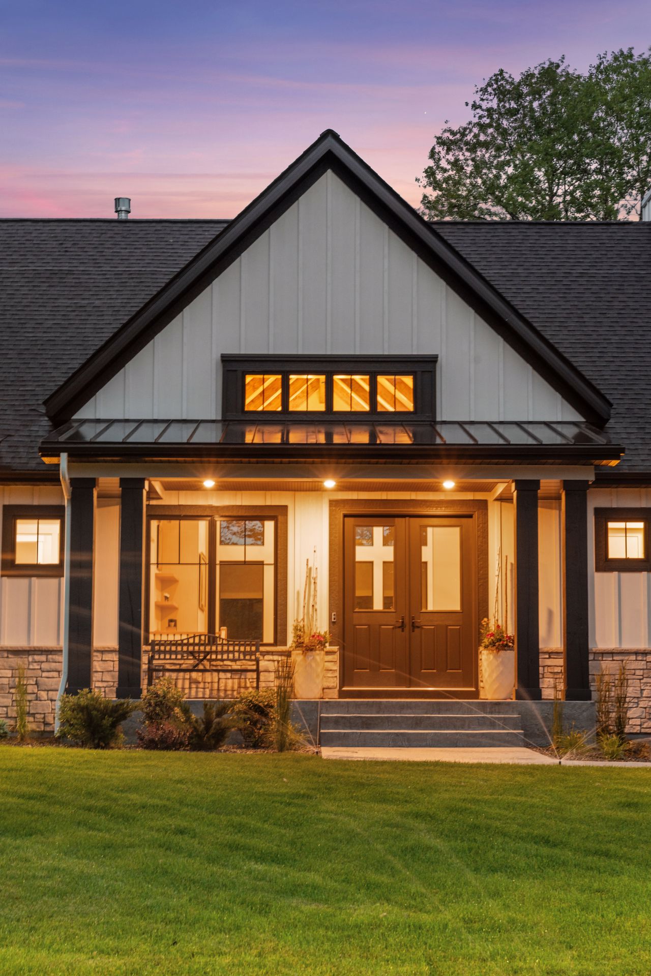 Home beautifully illuminated at dusk